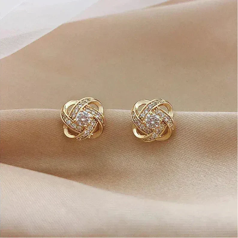 Lourdes — Boucles d'Oreilles Spirale Dorée et Cristaux