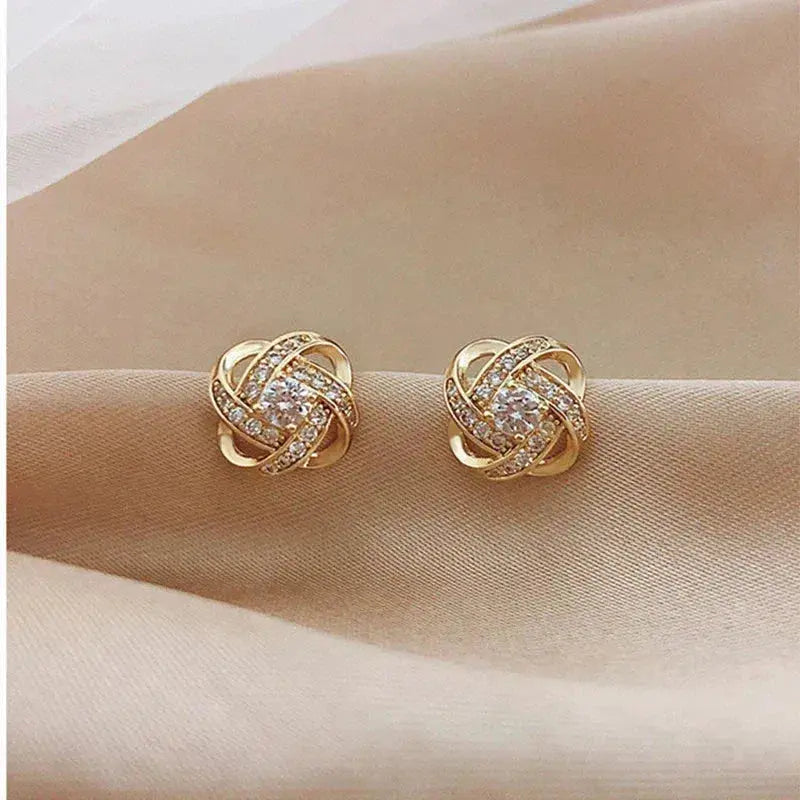 Lourdes — Boucles d'Oreilles Spirale Dorée et Cristaux