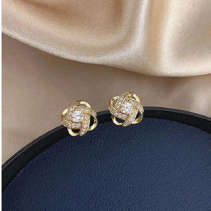 Lourdes — Boucles d'Oreilles Spirale Dorée et Cristaux