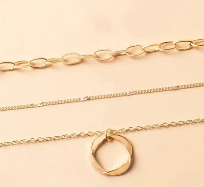 Trinidad — Collier Doré Multicouche à Pendentif